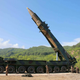 North Korean leader Kim Jun Un, second from right, inspects a Hwasong-14 ICBM on July 4, 2017 prior to launch. KNCA photo